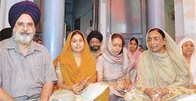 Br Balwant Singh, secretary, Sarb Rog Ka Aukhad Naam Mission, with some of the patients who had benefited from meditation therapy in Ludhiana on Friday