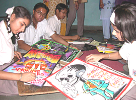Students take part in a painting competition at YPS, Mohali, on Saturday.