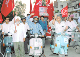 Members of the Centre of Indian Trade Unions (CITU) take out a prabhat pheri to mark May Day in Chandigarh on Sunday.