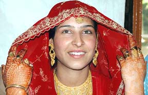 Kashmiri girl Samie, who got married to her relative Ajmal Basharat, resident of PoK, at Bandipora in Baramula district of north Kashmir on Saturday.