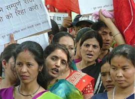 Nepalese organisations and trade union workers demonstrate against Nepal King Gyanendra on the occasion of May Day at Jantar Mantar in New Delhi