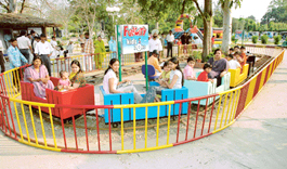 Children along with their parents enjoying the rides at Funcity Kidz Zone at Sukhna Lake, on Monday. 