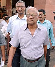 CPI General Secretary A.B. Bardhan and his party comrade D. Raja come out of Parliament House after meeting Union Petroleum Minister Mani Shankar Aiyar in New Delhi on Monday. 