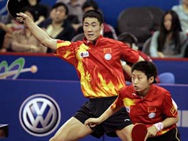 Wang Liqin and Guo Yue from China in action during their Mixed Doubles match against Guo Yan and Yan Sen, also from China, at the 48th World Table Tennis Championships in Shanghai on Wednesday. Wang and Guo won the match 4-1.