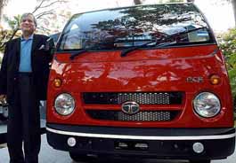Ravi Kant, Executive Director (Commercial Vehicles) of Tata Motors, poses with mini-truck, Ace, in Bangalore on Thursday. 