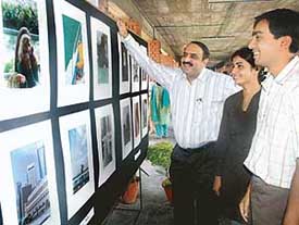 Raj Rishi Grag and Garima Gulati students of Chandigarh College of Architecture tell about their photographs at an exhibition
