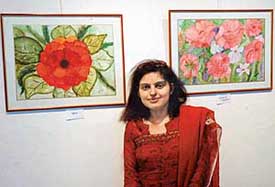 Shivani Sood with her art work on display at an exhibition titled Imprints at government Museum and Art Gallery