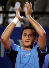 Nicolas Almagro of Spain celebrates after defeating Marat Safin of Russia during their match at the Italian Masters tournament in Rome