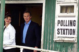 Prime Minister Tony Blair leaves after voting with his wife Cherie Blair in Trimdon, near Sedgfield, on Thursday