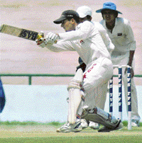 Vishal of Chandigarh hits a boundary against Ludhiana during under-17 inter district M.L. Markan Cricket Trophy at the PCA stadium on Friday.