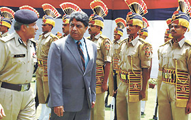 Union Home Secretary V. K. Duggal inspecting a guard of honour at the police headquarters in the Capital on Friday. Police Commissioner Dr K.K. Paul is also seen in the picture