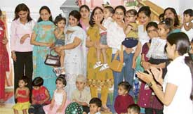 Students of Cherry Lane Play School celebrate Mothers Day with their mothers on the school premises on Friday
