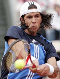 Spain's Fernando Verdasco returns a ball to Andy Roddick of the USA during the Rome Masters tennis tournament at Rome's Foro Italico