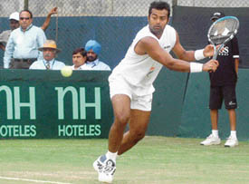 Resisting the temptation of achieving a personal milestone, Paes fielded Harsh Mankad in the reverse singles