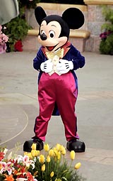 Disney character Mickey Mouse arrives at Disneyland's 50th anniversary celebrations in Anaheim, California, on Thursday