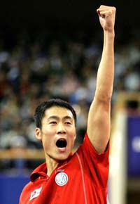 Chinas Wang Liqin rejoices after winning the mens singles final at the 48th World Table Tennis Championships in Shanghai