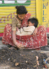 Unmindful of International Mothers Day celebrated all over the world on Sunday, this woman ragpicker is busy with her routine work.