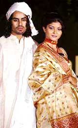 Models showcase Assamese silk garments during the National Handicrafts Expo, 2005, in New Delhi on Sunday