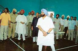 Capt Amarinder Singh, Punjab Chief Minister, plays a shot after inaugurating an indoor badminton hall at Guru Nanak Sarai, Sangrur, on Sunday
