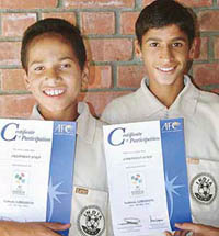 Arashpreet (left) and Simranjeet Singh are all smiles as they pose for photographs at St Stephens School in Chandigarh on Tuesday. 