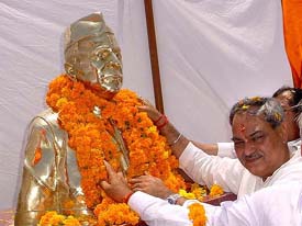 Haryana Excise and Taxation Minister Venod Sharma unveils the statue of the states first Chief Minister Bhagwat Dayal Sharma at Brahmanwas in Rohtak