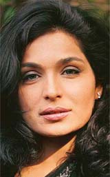 Pakistani film actress Meera poses during a promotion of her first Indian movie Nazar in New Delhi
