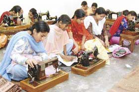 Women learning to stitch at the Shree Lakshmi Narayan Stitching School
