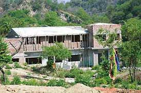 A view of the buildings that are being constructed allegedly on forest land by a Delhi-based resort developer near Basali village in Ropar district. 