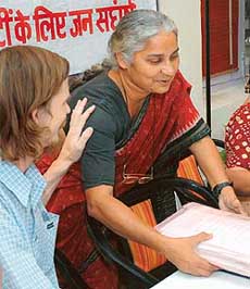 Jean Derze from France, who is a professor at the Delhi School of Economics, with activist of the Peoples Action for Employment Guarantee Medha Patkar at a press conference in New Delhi on Wednesday. 