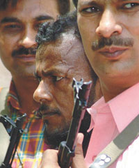 Aish-ul Rehman, the ISI agent, in the police custody in the Capital on Thursday.