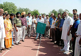 Hisar MP Jai Prakash flags off the 24-hour walk of Vaid Ratan Dev Jangra at the Giri Centre Stadium on the HAU premises in Hisar on Thursday.