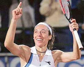 Italys Francesca Schiavone rejoices after defeating Serena Williams of the USA during the Italian Open womens tennis tournament at Romes Foro Italico on Wednesday. Schiavone won 7-6 (2), 6-1