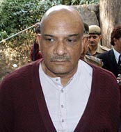 Businessman Vijay Sood, main accused in the porn CD case, on the way to the CJM court in Shimla on Friday.