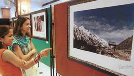 One of the beautiful shots captured by the lens of Surkhab Shaukin being admired by visitors. His 12th solo photographic exhibition opened on Friday at the Sutlej Club