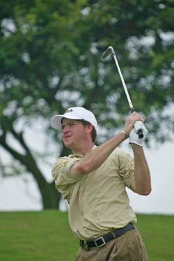 Title holder Jason Knutzon of the USA tees off during the second round of the Macau Open