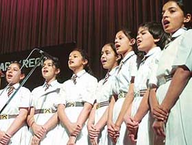 School students present a welcome song at a conference on Futuristic approach to education organised by the Independent Schools Association, Chandigarh
