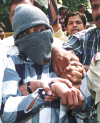 Ajit Kumar Katiyar, the prime accused being produced at the Patiala House courts in the Capital on Saturday
