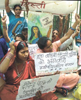 Activists of Pragati Mahila Sangthan protesting against the Delhi Police for its failure to nab the student rape accused at Parliament Street in the Capital 
