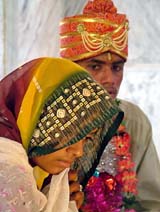 Chandar Singh (18) and his bride Asha (14) sit in a temple during their marriage ceremony in Rajgarh district, about 155 km northeast of Bhopal, on May 11. The Supreme Court has ordered human rights bodies in three states to inquire into reports of hundreds of child marriages despite a ban on such marriages. Thousands of children are married each year in villages in ceremonies shrouded in secrecy although it is illegal for girls to get married before 18 and boys before 21.  Reuters