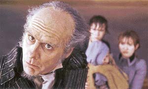 Count Olaf (Jim Carrey) with the Baudelaire orphans