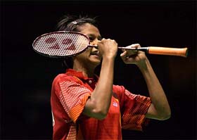 Fransisca Hari of Indonesia celebrates after winning her womens singles match against Camilla Sorenson of Denmark in the semifinals of the Sudirman Cup in Beijing