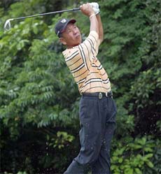 Wang Ter-chang of Taiwan tees off during the third round of the Macau Open