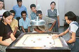 Carrom players in action in the St Stephens Ranking Carrom Meet played at St Stephens School, Sector 45, Chandigarh, on Sunday.