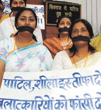 Women activists of Bharatiya Janata Yuva Morcha protesting against the DU student gang rape at the residence of Home Minister Shivraj Patil in the Capital on Sunday