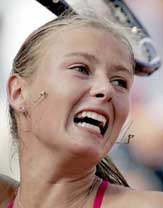 Russias Maria Sharapova in action against Switzerlands Patty Schnyder in the semifinal of the Italian Open tennis tournament at Romes Foro Italico on Saturday. Schnyder won 3-6, 6-3, 6-1.