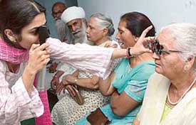 Patients being examined at a free eye check-up camp held for senior citizens at Sri Sathya Sai Old Age Home, Sector 30-B, on Monday. 