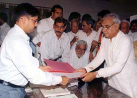 Haryana Chief Minister Bhupinder Singh Hooda files his nomination papers as a Congress candidate from the Kiloi Assembly constituency for the byelection in Rohtak
