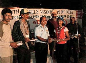 Gp Capt Gandhi of the Indian Air Force gives away certificates to the participants