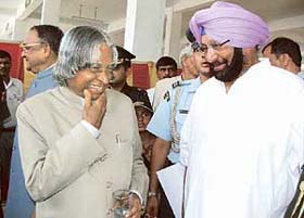 President A.P.J.  Abdul Kalam interacts with Punjab Chief Minister Capt Amarinder Singh during the Standard Presentation to 68th Armoured Regiment somewhere in western sector on Monday. 