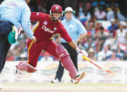 West Indies batsman Brian Lara runs during the fifth one-day international match against South Africa at the Queens Park Oval in Port of Spain on Sunday. 